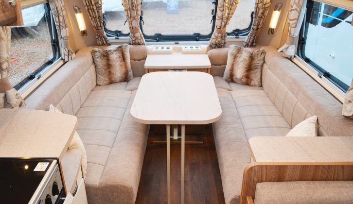 There's a handy storage space at the end of the kitchen unit, just one of many neat, luxury touches in this six-seat lounge – it's a pity the freestanding table is stored at the back of the van, though