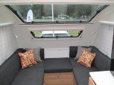 The modern, Brunello Black upholstery gets a splash of colour thanks to these bright cushions, the sunroof also letting lots of light in