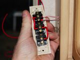 Fit the original wires and the ‘piggy-backs’ into the new light switch and fix to the wall