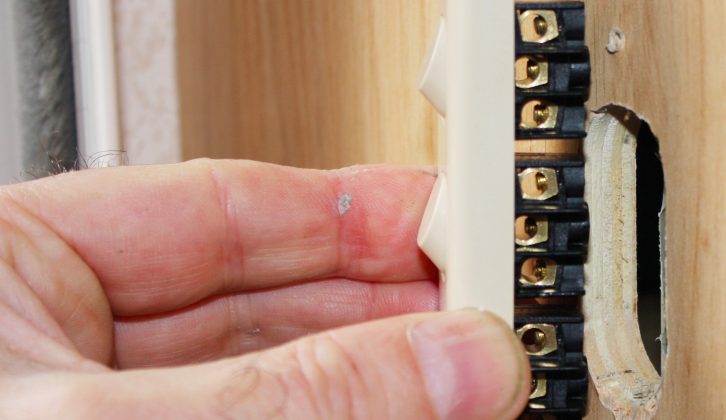 Offer up the new switch to the old hole and measure for any additional cutting/drilling