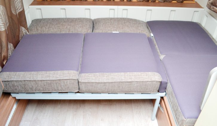Extend the aluminium frame and drop in the back cushions to make up the front bed (2.10m x 1.26m)
