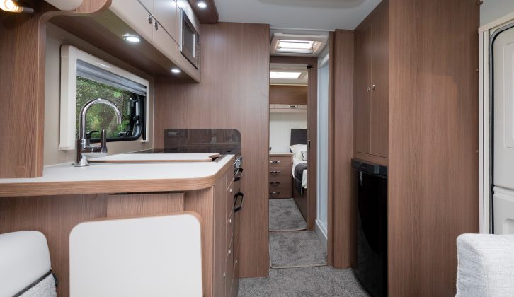 The four-berth Elddis Affinity 574 has a central-washroom, fixed-twin-single-bed layout