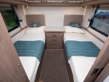 You get these fixed singles plus a central washroom in the twin-axle Camino 674