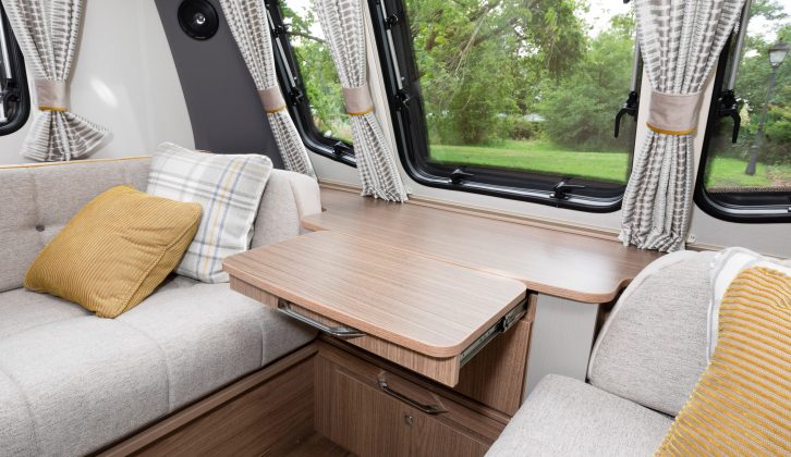Bright scatter cushions and attractive curtains lift the lounge of the 2018-season VIP 675