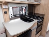 Fenix worktops also feature in the new-season Pastiche vans, as seen in this four-berth 565