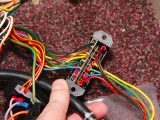 Attach the new wires to their connections in the fuse box, and tidy with cable-ties