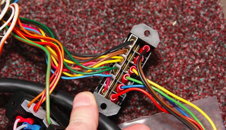 Attach the new wires to their connections in the fuse box, and tidy with cable-ties