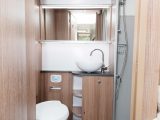 The washroom in the Bailey Unicorn Cadiz is stylish, with a concealed cistern and a bowl sink