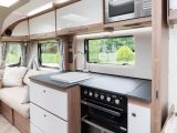 The smart kitchen of the 2018 Bailey Unicorn Cadiz boasts a rooflight rather than an Omnivent