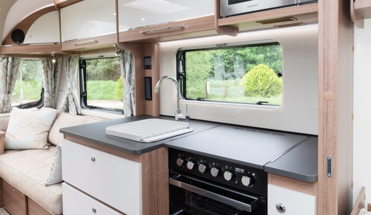 The smart kitchen of the 2018 Bailey Unicorn Cadiz boasts a rooflight rather than an Omnivent