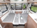 The Elddis Affinity 574's front double bed measures 1.99m x 1.13m, but the sofas are too short for adults to use as singles