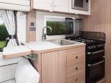 There's lots of storage space in this Elddis caravan's kitchen, plus a worktop extension flap