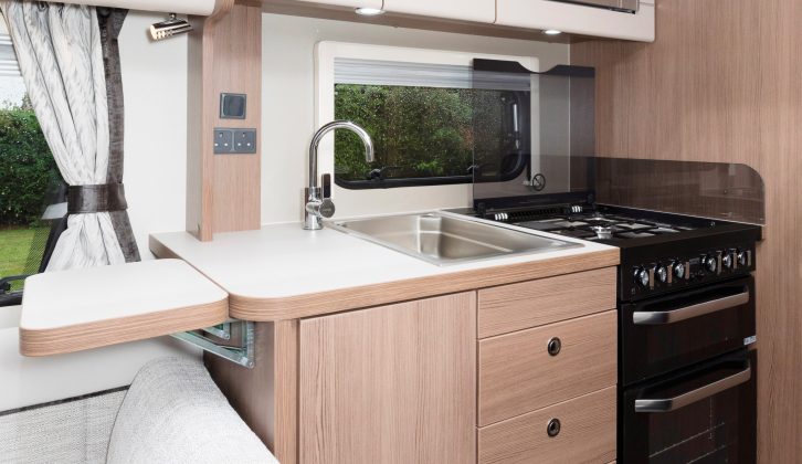 There's lots of storage space in this Elddis caravan's kitchen, plus a worktop extension flap