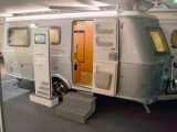 The new Eriba Touring Troll 535 has a rear transverse double bed, a front lounge, and a washroom and kitchen in the middle