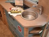 This is the brightly coloured kitchen of the six-berth Tabbert PEP 550 DM 2.3