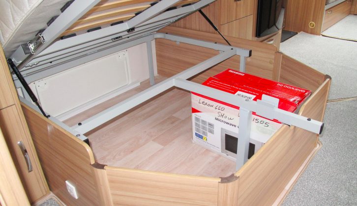 The bed might not be huge, but it has this big storage space beneath it – with external access