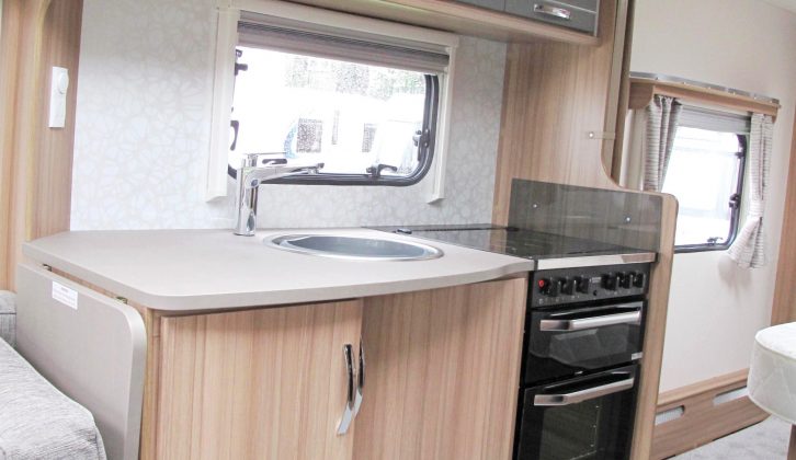 The worktop extension flap means there's plenty of space, and there's a neat splashback plus storage is good here