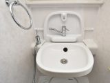 The hand basin folds down when needed – you should inspect for any damp in the rear, but it’s not common
