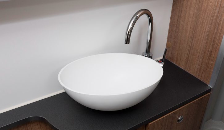 The salad-bowl sink and elegant tap remind you that this is a high-end tourer