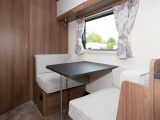 The dinette provides extra dining space, plus handy additional storage overhead and under the seats