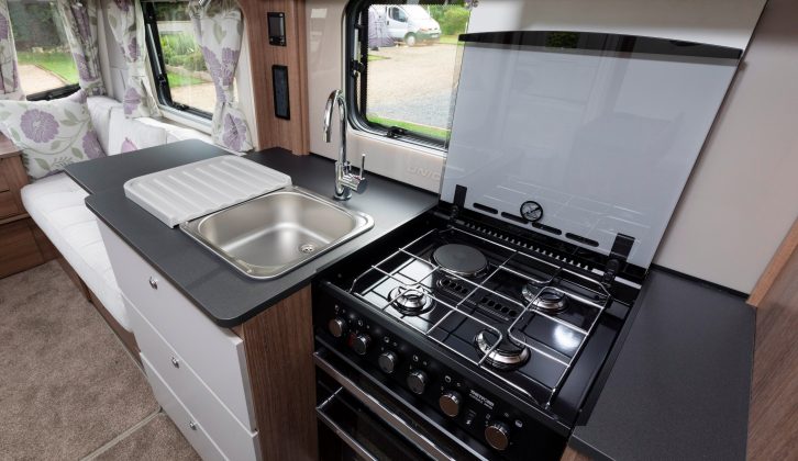There's a lift-up worktop extension on the left, room for pan-handles on the right and the hob's lid provides extra workspace, too