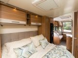 You get lockers and shelves above the Bailey Pegasus GT70 Brindisi's transverse island bed