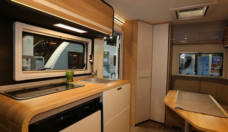 Note the contemporary materials and curved styling inside the Knaus Travelino