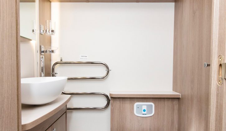 The offside half of the central washroom contains a vanity unit, a cassette toilet and storage