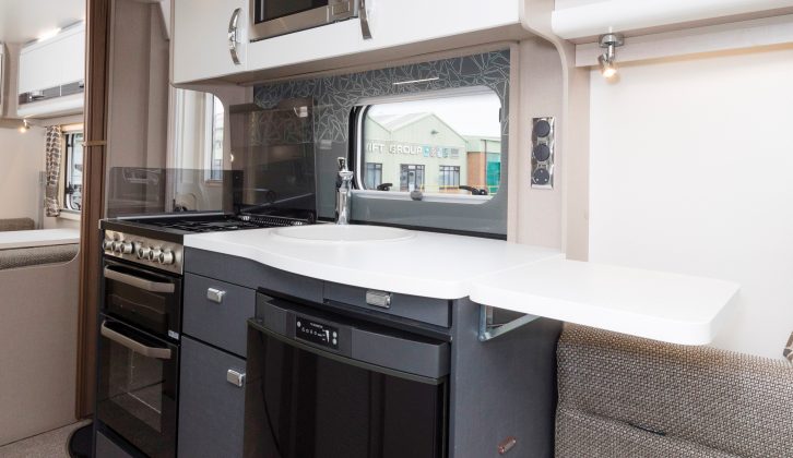 The nearside kitchen looks sharp – the illuminated splashback is part of the Lux pack upgrades