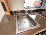 The large stainless-steel sink and matching four-burner hob on our test van had aged well
