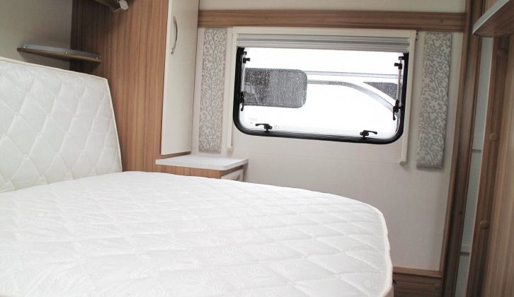 The 2018 Lunar Delta TR's in-line island bed is 1.7m long and 1.32m wide, and is flanked by wardrobes and large drawers that function as bedside tables