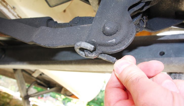 The hook that attaches the cable to the caravan’s brake mechanism must be cut