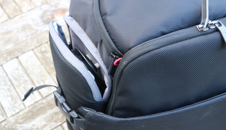 The zipped side compartments have pockets in them, so it's easy to find what you're looking for
