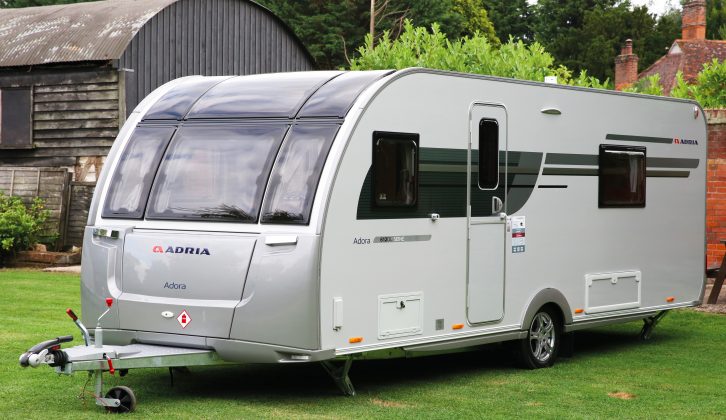 Grey sides and silver skirts lend the 2018 Adria Adora 612 DL Seine a sleek look