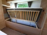 Push the fixed beds up to reveal storage space beneath – with external access on the nearside