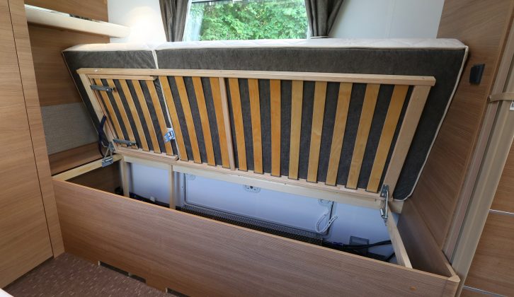 Push the fixed beds up to reveal storage space beneath – with external access on the nearside