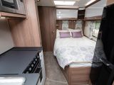 The fixed nearside double bed is 1.98m x 1.30m and there's a shelf for a TV