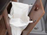 The washroom's laundry basket has been upgraded from the third-generation range of Bailey caravans