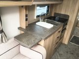 There's also a lift-up extension flap and a stylish tap in the kitchen of this Elddis caravan
