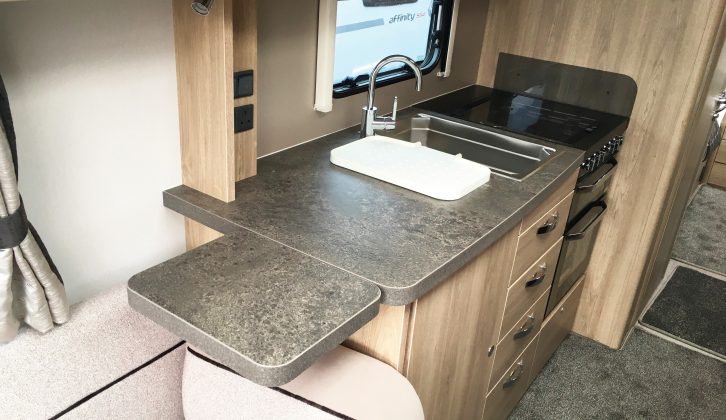 There's also a lift-up extension flap and a stylish tap in the kitchen of this Elddis caravan
