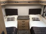 The fixed rear beds aren't especially long, but the good-sized centre chest is a boon