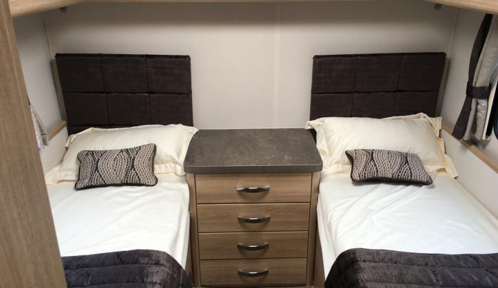 The fixed rear beds aren't especially long, but the good-sized centre chest is a boon