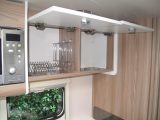 Overhead are some cupboards, racking handy for keeping items in place when on the road