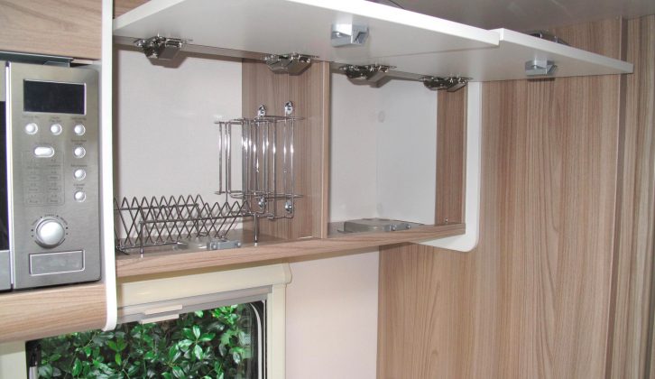 Overhead are some cupboards, racking handy for keeping items in place when on the road
