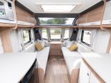 The comfortable sofas in the Coachman VIP 460 are each 6ft long with generous bolsters, and are finished in pale fabrics