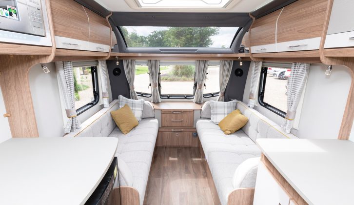 The comfortable sofas in the Coachman VIP 460 are each 6ft long with generous bolsters, and are finished in pale fabrics