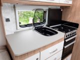 There is plenty of space for food preparation in this offside kitchen, plus a dual-fuel hob and a separate oven and grill