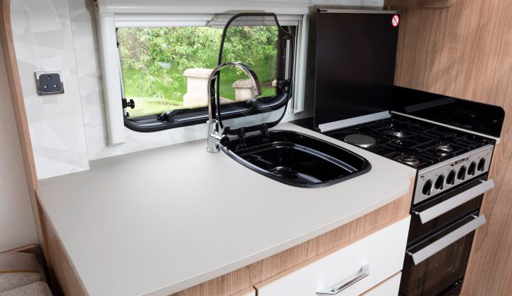 There is plenty of space for food preparation in this offside kitchen, plus a dual-fuel hob and a separate oven and grill