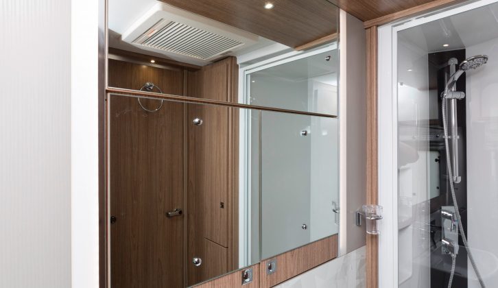 This concealed mirror cabinet is another classy touch – and there's further storage space under the sink, too