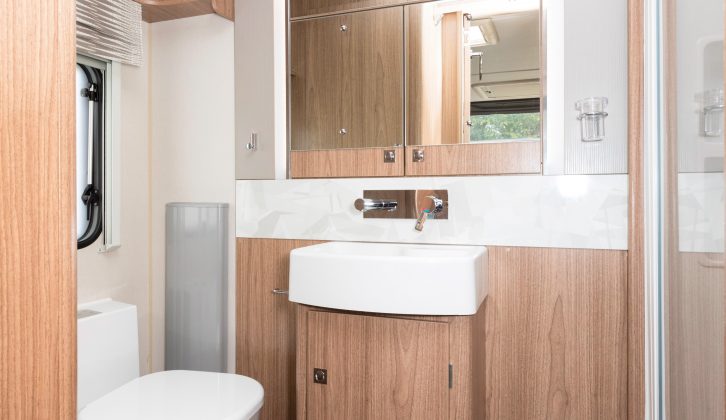 The full-width end washroom in this new-for-2018 Coachman caravan is smart, light and packed with storage